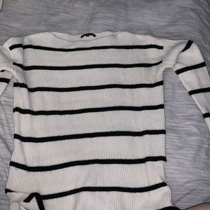 White and black striped sweater. Gently used.